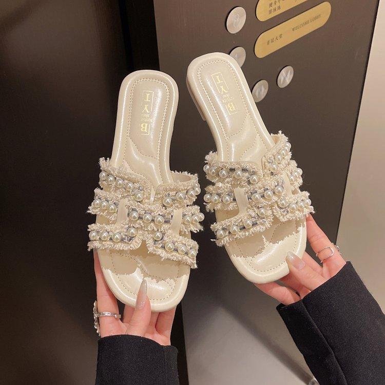 Direktverkauf ab Werk Xiaoxiangfeng Hausschuhe Damen Sommer Mode 2025 neu Sommer flacher Boden Ein-Wort coole Hausschuhe ins Tide