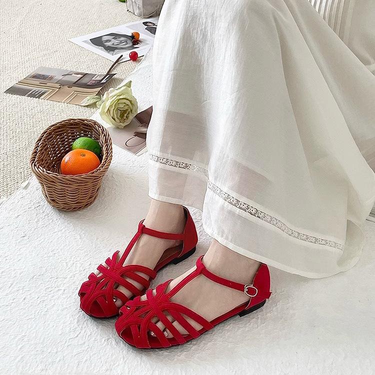 French summer new hollowed-out one-word strap Roman shoes flat-bottomed bag head sandals women's Mori women's niche design hollow