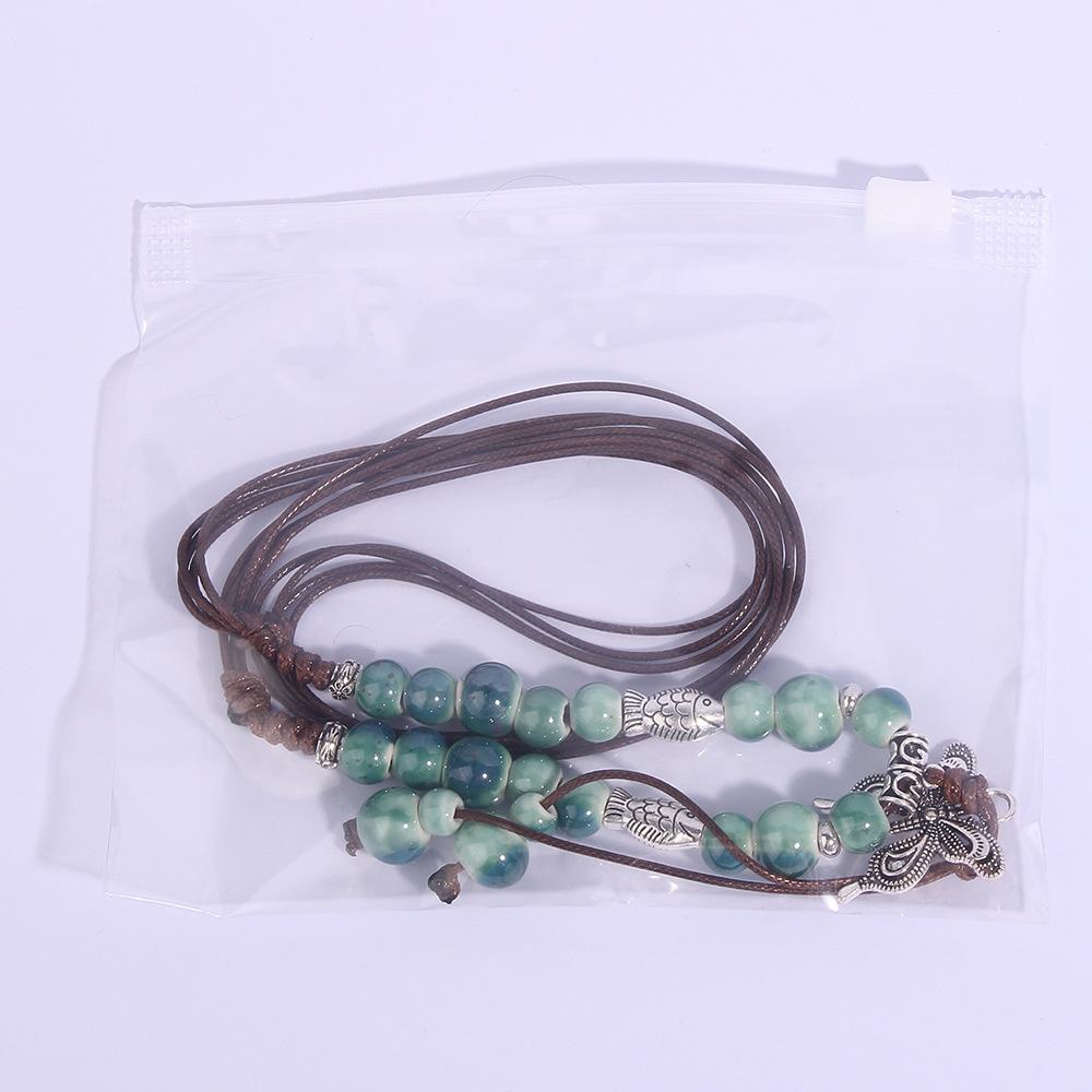 Etnisk stil keramik lång tröjkedja, handgjort vävt hänge för kvinnor, fjärilshalsband i konstnärlig stil