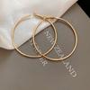 Silver Needle Minimalist Round Tassel Earrings: Light Luxury Ear Cuffs with Chic, High-End Style