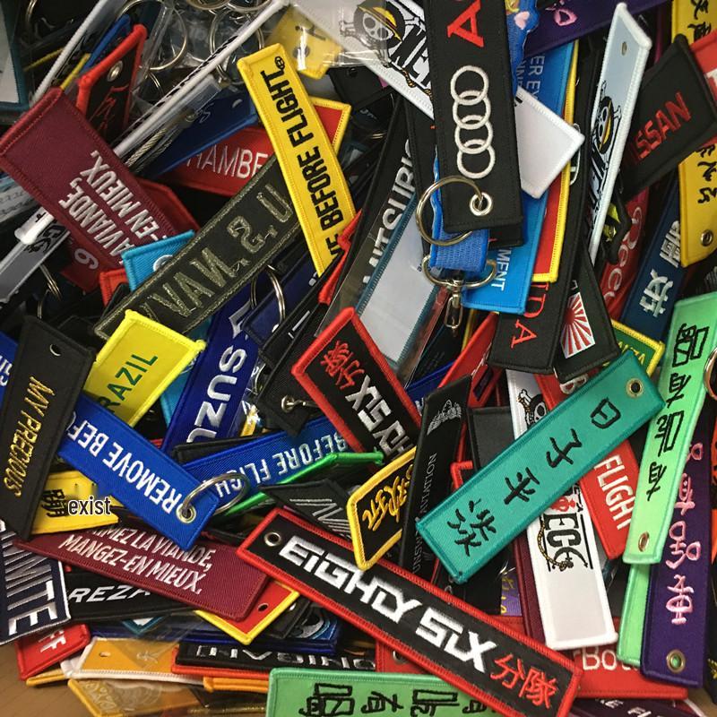 

Двусторонний вышитый брелок-котик с тканой этикеткой - Бесплатная доставка, Идеальный подарок