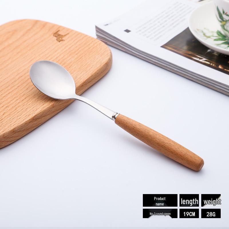 Western Cutlery Set: Stainless Steel with Wooden Handles - Includes Steak Knives, Dessert Spoons, Pasta Forks, and Spoons.