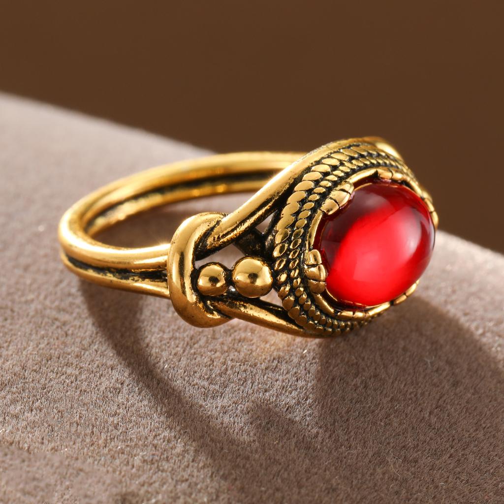 Retro-style coiled artificial gemstone ring made of copper for ladies' jewelry. Suitable for formal events and parties.