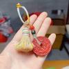 Unisex Cinnabar Red Ghost Coin Keychain – Elegant & Versatile Ornament
