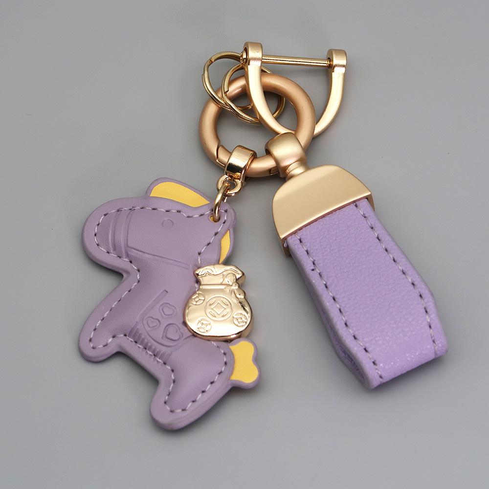 Kleiner Schaf- & Pferdeleder-Schlüsselanhänger mit Perlenanhänger - Gold