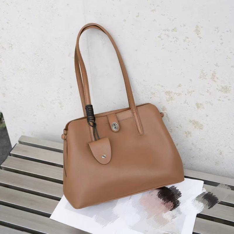 Leder-Umhängetasche große Kapazität vielseitig Herbst und Winter neu Achseltasche leichter Luxus Anhänger schlicht Nische Damen-Tasche