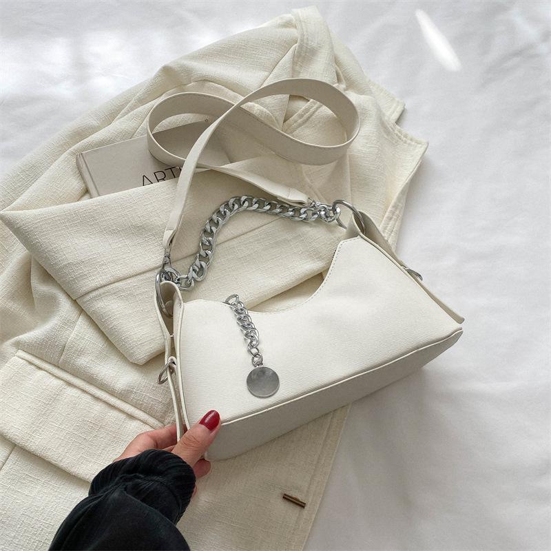 

В этом году популярная маленькая женская сумка 2025 новая осенняя мода простая сумка-мессенджер повседневная мода зарубежный стиль ручная сумка белый