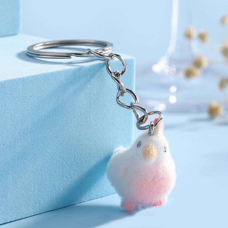 

Милый мультяшный объемный флокированный брелок-подвеска в виде попугая из смолы, брелок-подвеска для автомобиля, украшение для сумки розовый