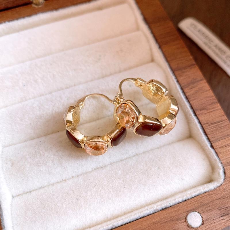 Zirkon Perlmutt Sunburst Ohrklemmen: Elegante, vielseitige Ohrringe für Frauen.