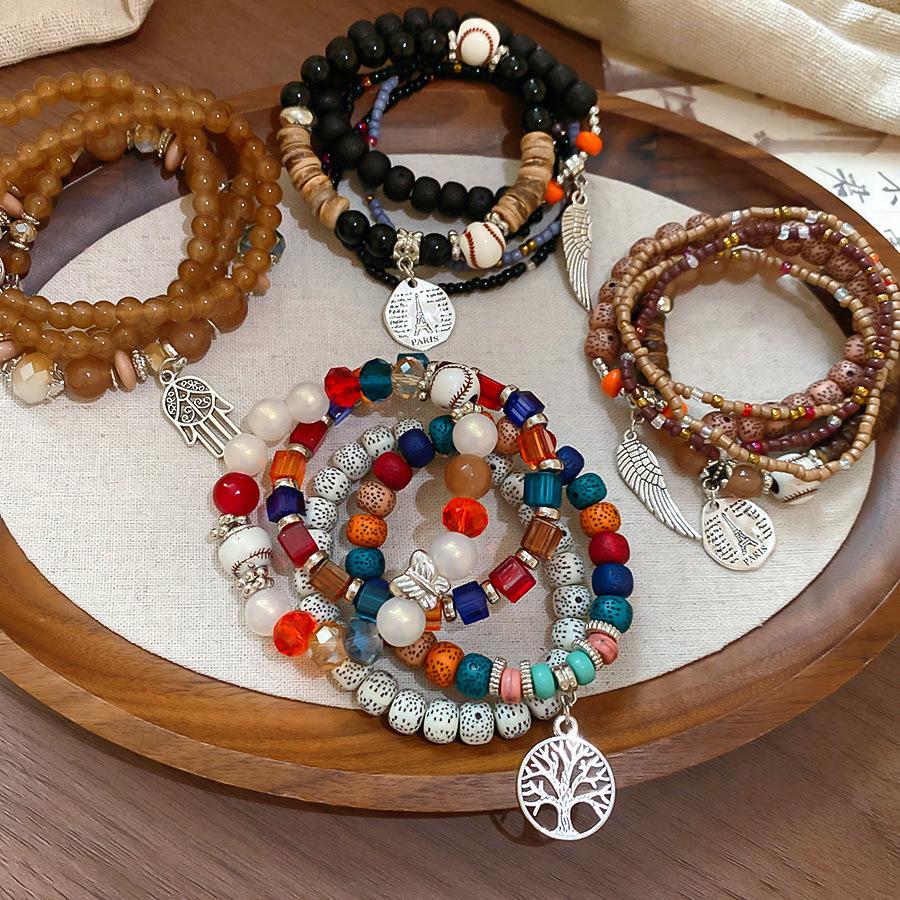 Glass Coconut Shell Beaded Wing Pendant Bracelet: Trendy, Luxurious, Versatile Jewelry for Women