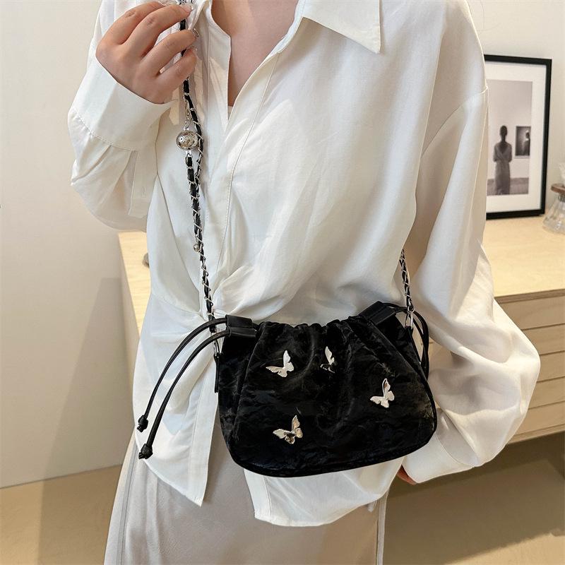 High-End Women's Metallic Bow Bucket Bag - Autumn 2024 Niche Fashion Drawstring Style