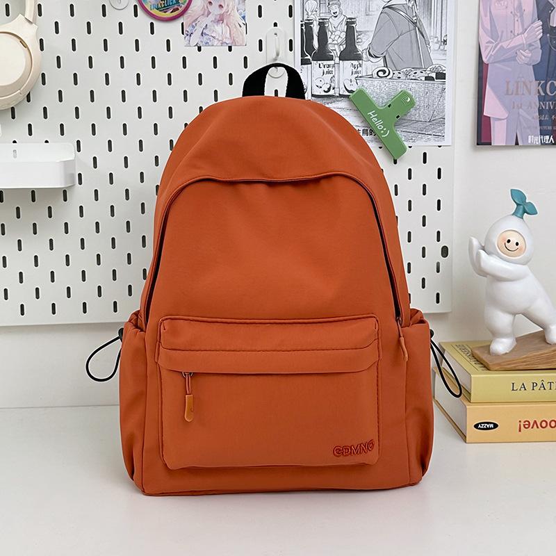 Korean high-value backpack for junior high school students, casual, simple, fashionable and versatile, large capacity