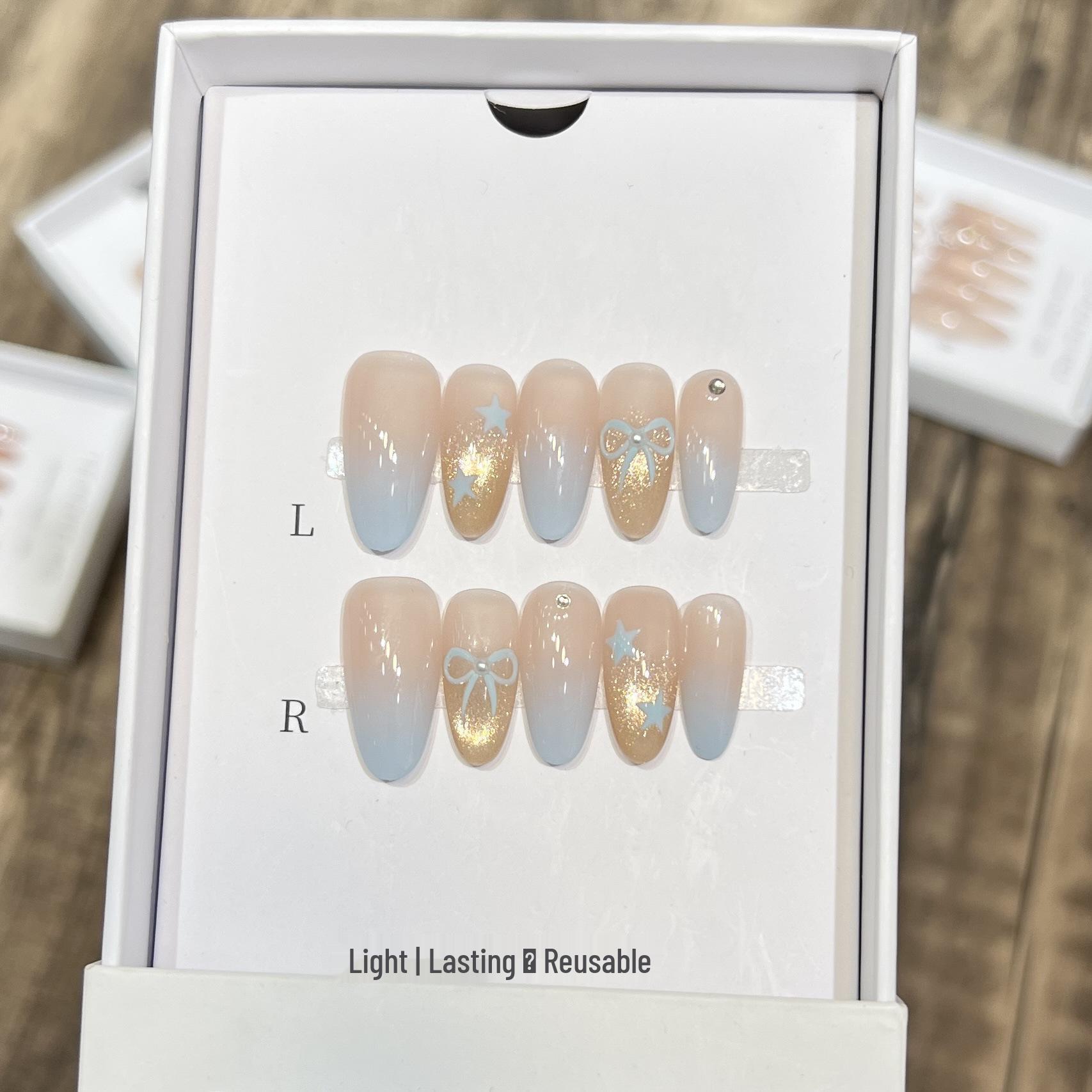 

Dairuisen Ice Blue Cat Eye Crystal Bow Handmade Nail Tips Large (L)