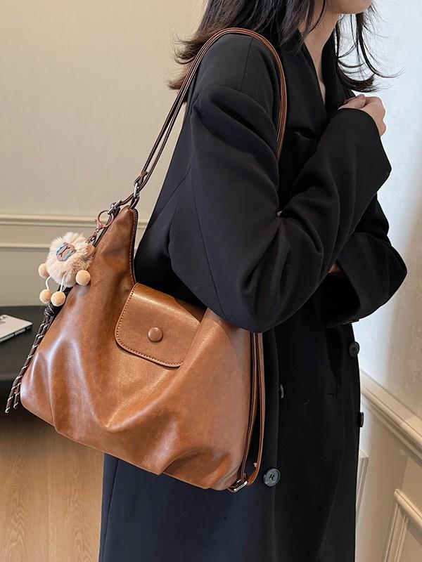 Nische Retro 2025 Damen Schulter-Crossbody-Tasche mit großem Fassungsvermögen und Anhänger