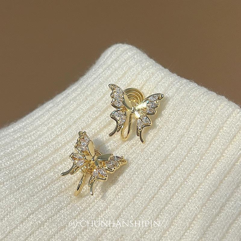 

Light luxury texture butterfly zircon mosquito coil disc ear clips without ear holes, super flash unique temperament design sense stud earrings women