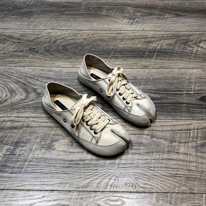 

ins split-toed canvas pig s trotters half slippers women s outer wear 2025 spring and summer new lace-up bag head slippers versatile retro 40