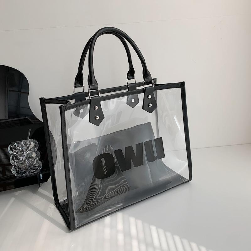 

Summer C transparent jelly bag women s new work tote bag briefcase versatile shoulder tote big bag Letter Bag прозрачный