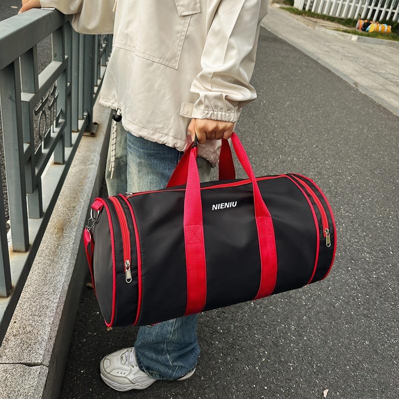 The same style for men and women, trendy and fashionable, going out for travel, large-capacity hand luggage, student school clothes storage bag