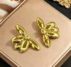Stainless steel high-end gold earrings, niche design light luxury metal studs, temperament earrings