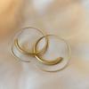 A Pair of Golden Metal Matte End Hoop Earrings with a Easy And Elegant Style, Perfect for Daily Wear, Parties, And Dates
