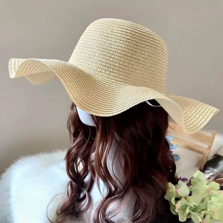 

Summer big eaves sunshade straw hat Korean version face covering seaside vacation sun hat foldable temperament spring and summer sunscreen hat women