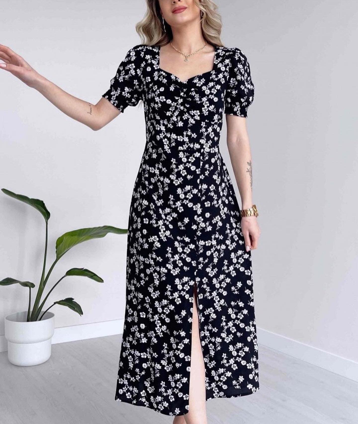 

Новое сезонное платье с разрезом и воротником с узором