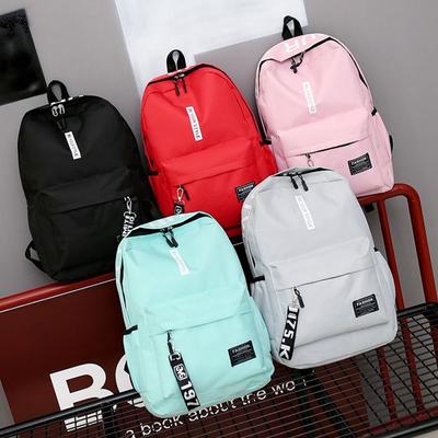 Mochila casual elegante de cor sólida Bolsa escolar masculina e feminina à prova d'água mochila de viagem bolsa de lona
