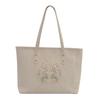 Casual beautiful bag women's spring and summer new commuter messenger bag niche personality portable tote bag