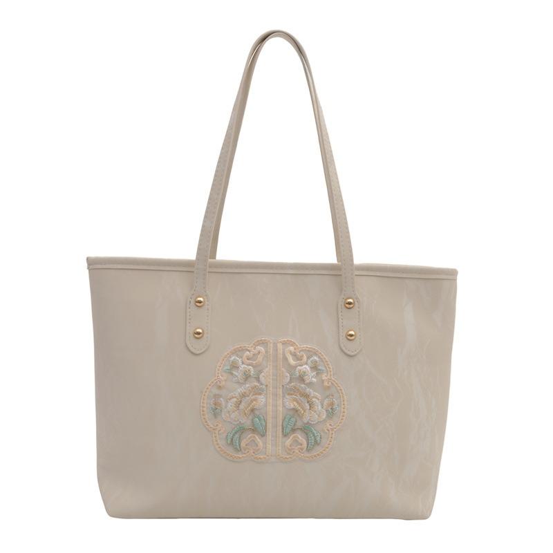 Casual beautiful bag women's spring and summer new commuter messenger bag niche personality portable tote bag