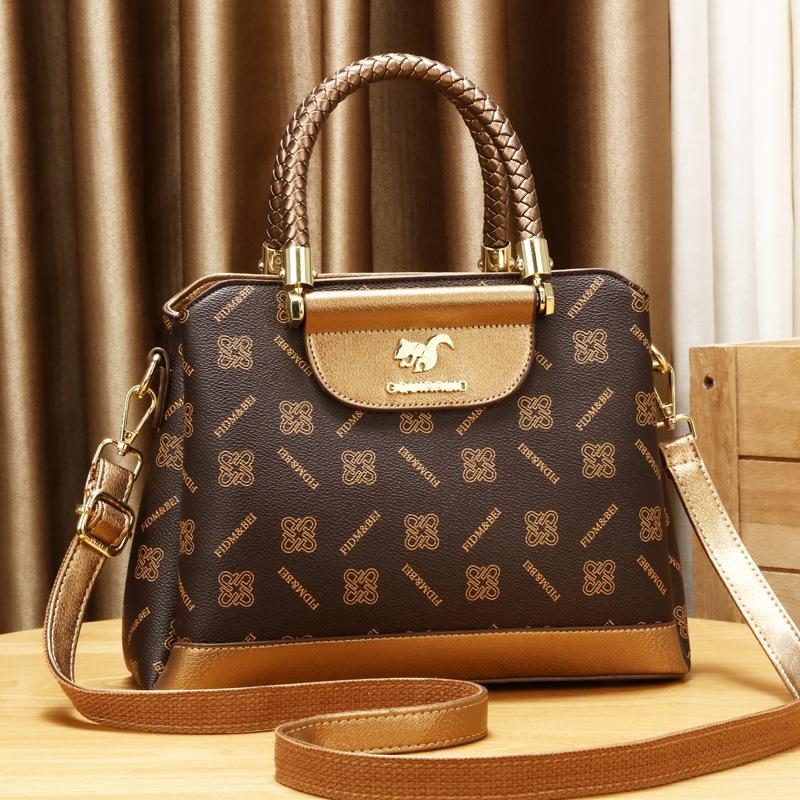 

Осенне-зимняя женская сумка 2025 новая модная портативная сумка-мессенджер большой вместимости для мамы среднего возраста золотой