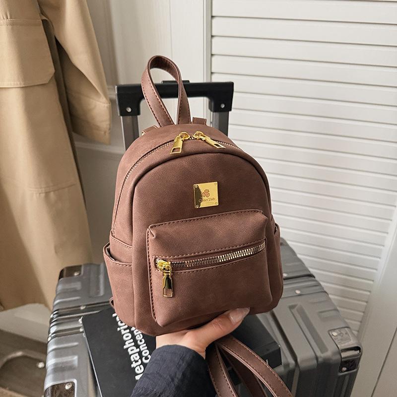 

Backpack women s large-capacity casual versatile student class schoolbag Korean version of high-quality high-value lightweight travel backpack темно-коричневого