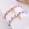 Blue Floral Printed Round Bead Bracelet Gold Tone Stone Bow Charm Vintage Chinese Style Elegant Wrist Jewelry for Women