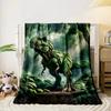 A dinosaur-shaped figure created entirely from overlapping green leaves. for all seasons blanket lunch break throw gift