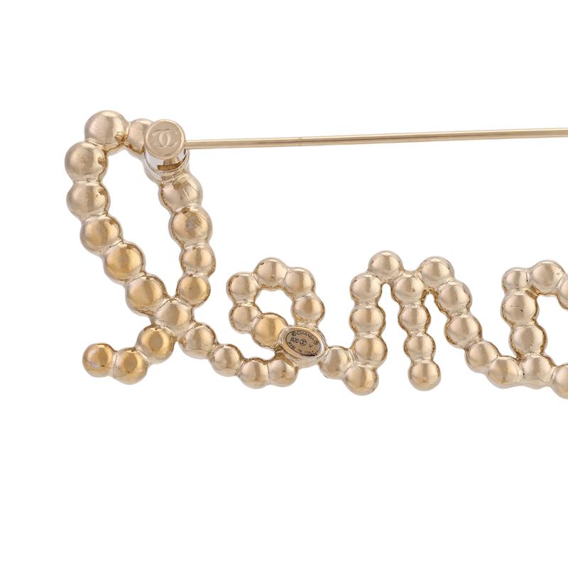 CHANEL letter gold rhinestone brooch women's gold