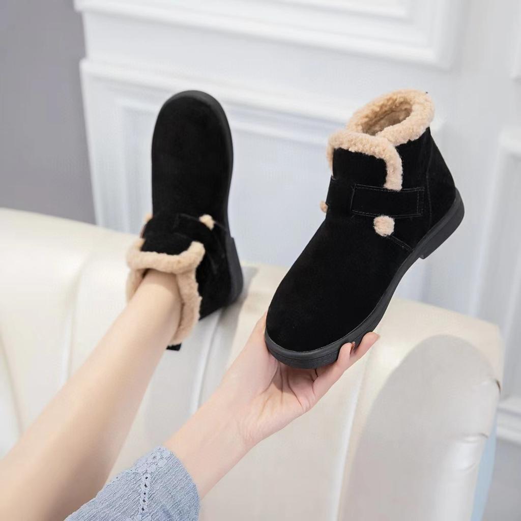 Leather snow boots women's cotton shoes autumn and winter new soft-soled piled thickened warm fluffy shoes flat short boots