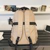 High-value retro tooling trendy and cool backpack for junior high school students, casual, simple, lightweight and large-capacity backpack.