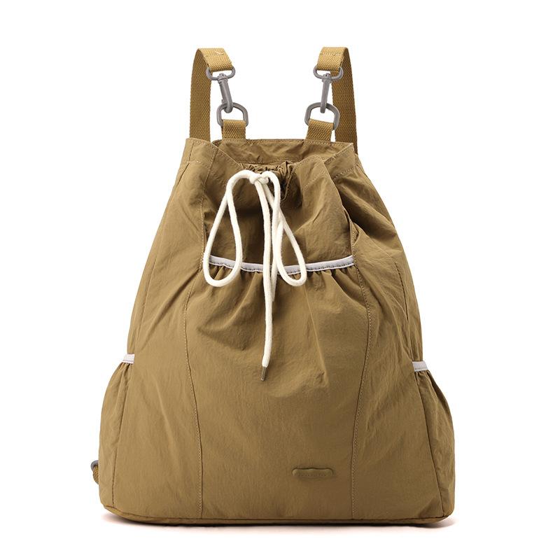 Niche design women's casual backpack college wind lightweight drawstring backpack