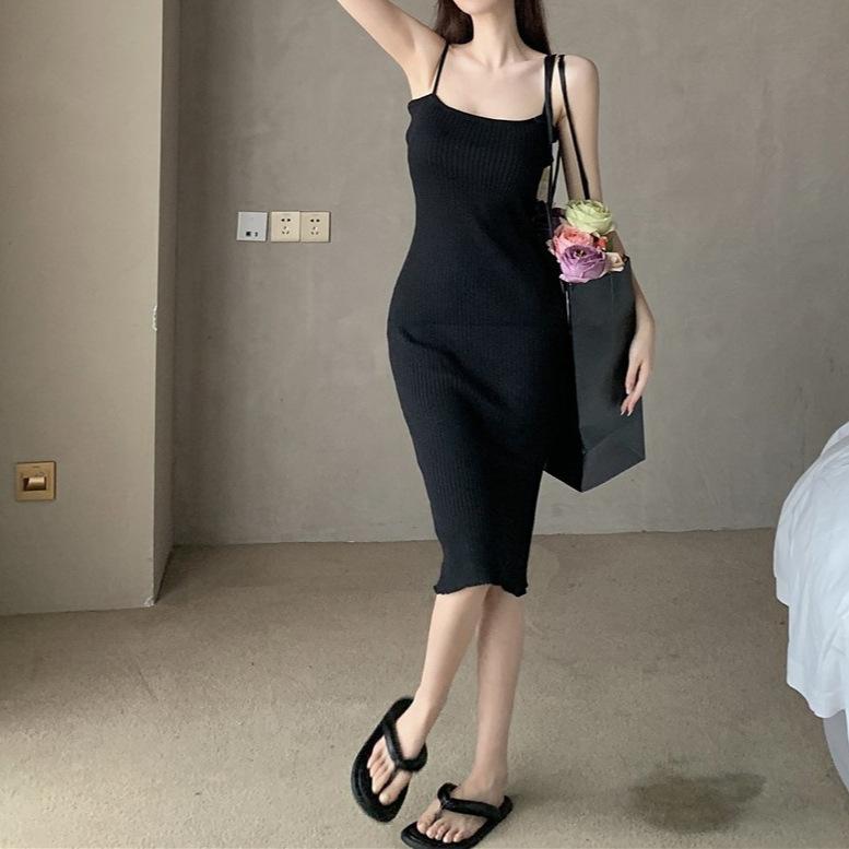 Summer striped knitted suspender dress women's temperament slim-fitting royal sister hip skirt light and mature wind medium and long skirt