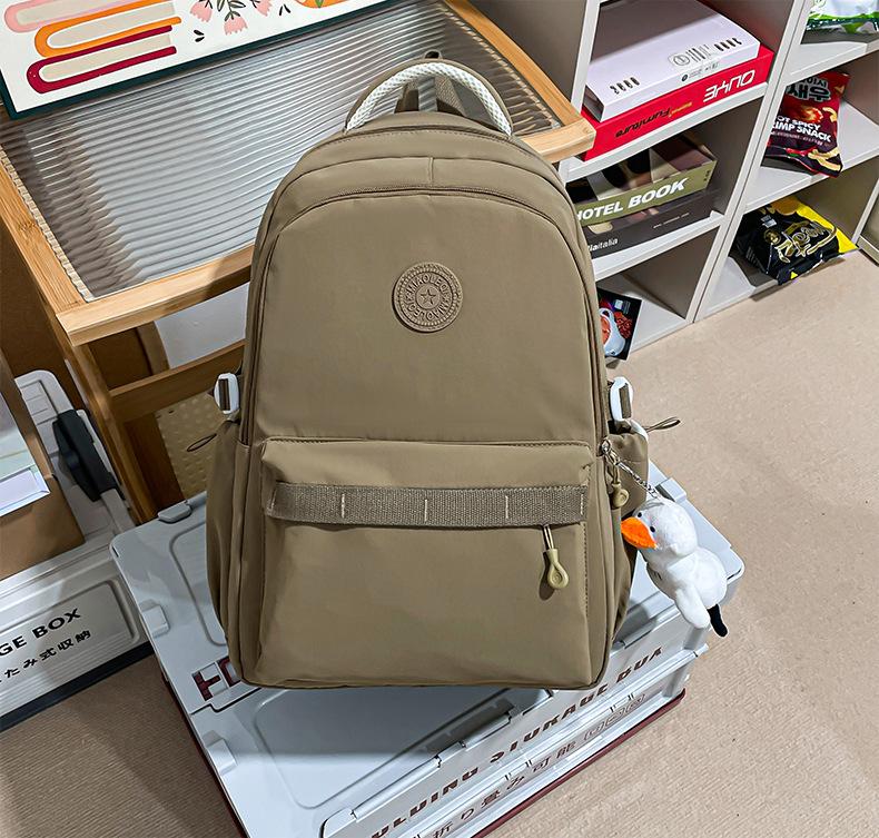 Schoolbag Large capacity class Commuter travel School bag Niche Korean female high school students Versatile simple casual lightweight backpack