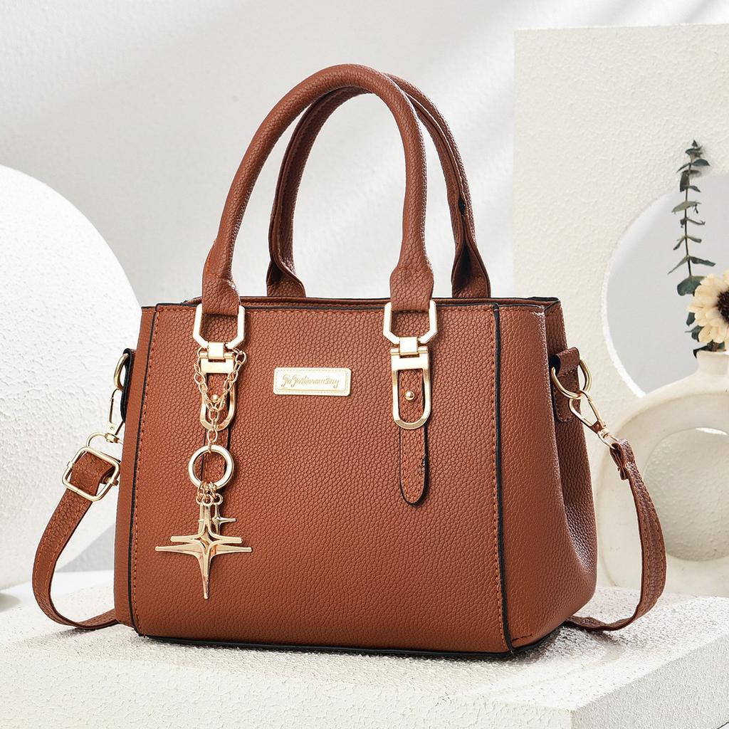 Simple and large-capacity hot-selling handheld women's bags 2026 new fashionable and versatile PU material single shoulder oblique span small