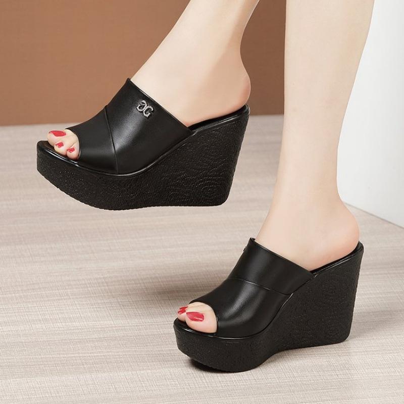 

One-word women s sandals summer wear muffin thick-soled waterproof table hollow fish mouth high heels women s cool slippers wedge heel 35 чорний