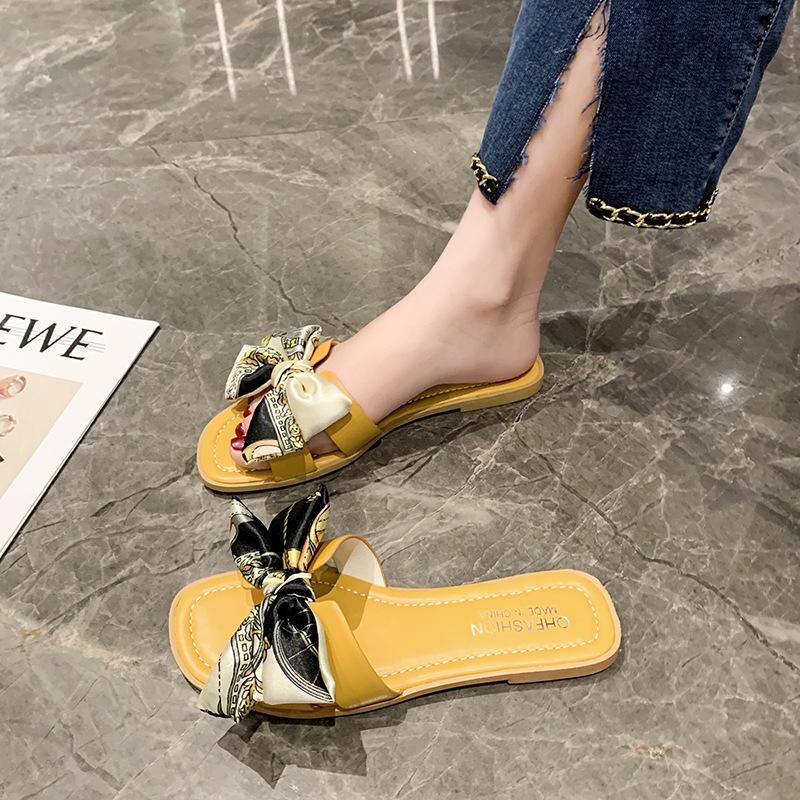 Bow slippers women's outer wear 2024 summer new flat-bottomed fashion fairy wind large size one-word cool slippers women's shoes