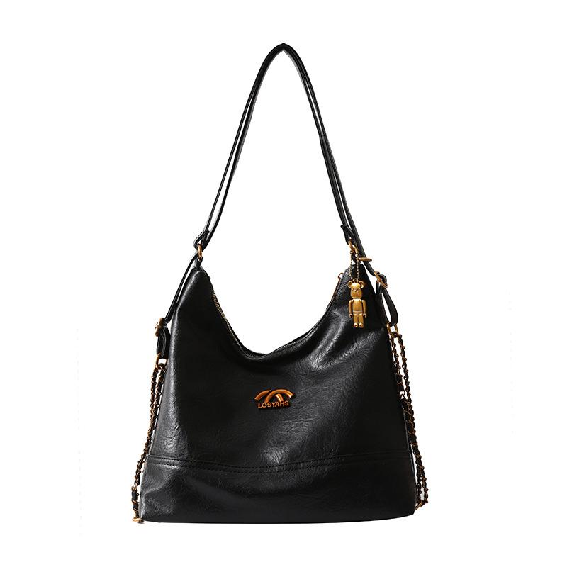 

Простые ретро-модные сумки большой вместимости через плечо и сумки подмышки — это новый стиль для женщин.