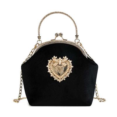 Bolsos cruzados con clip dorado para mujer, bolso de hombro con cadena Vintage con decoración de Metal en forma de corazón
