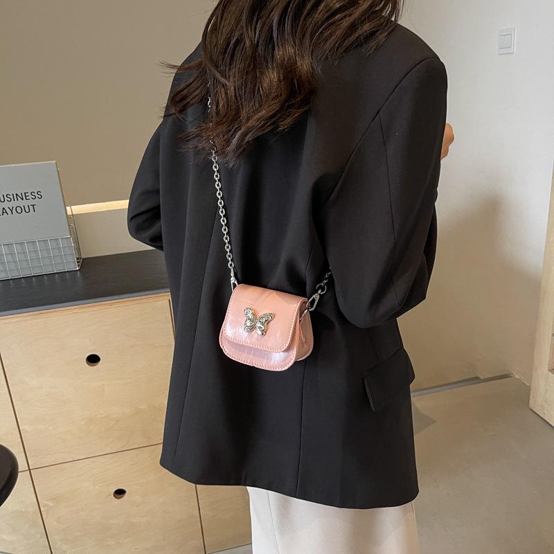 

High sense niche mini bag women 2024 new fashion chain messenger bag Internet celebrity super popular saddle bag рожевий