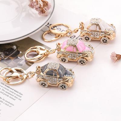 Llavero con colgante en forma de coche creativo, llavero con incrustaciones de diamantes de imitación coloridos, bolso, abalorio de recuerdo, accesorios de moda