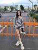 American-Style Oversized Off-Shoulder Sweater: Letter Print, Long Sleeve, Casual Loose Fit for Women In Early Autumn.