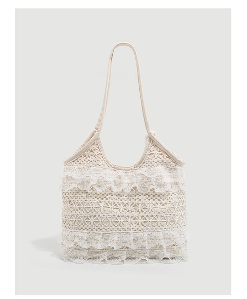 

Going to the seaside to weave large-capacity women s summer casual lace mesh single shoulder armpit bag