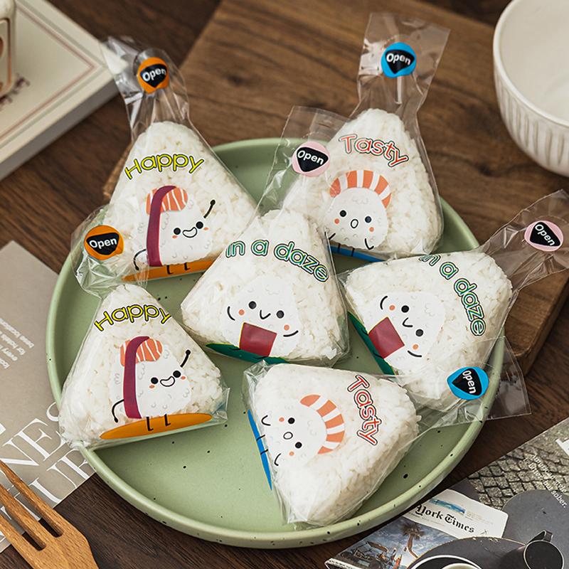 50/100 ks Krásný kreslený trojúhelníkový sáček na balení rýžových koulí mořské řasy Onigiri Sushi Forma na výrobu benta Příslušenství k bento Sáčky na sushi