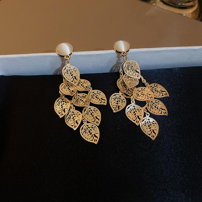 Silver needle opal hollow leaf fringed earrings European and American exaggerated personality high-end stud earrings earrings pendant long earrings
